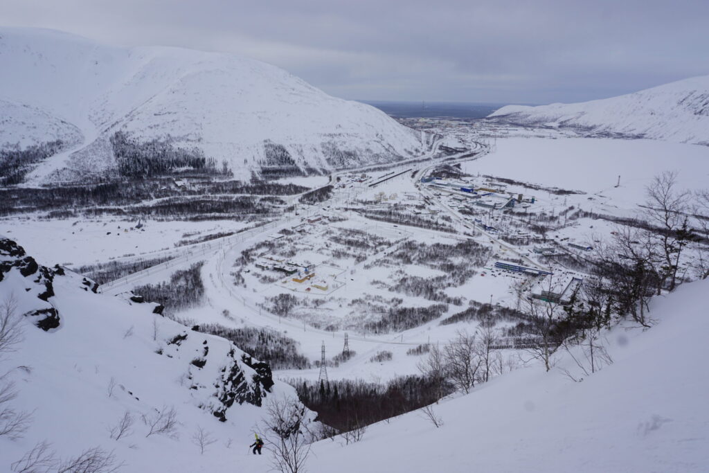 Climbing up Mount Juksporr with the Kirovsk area in the background